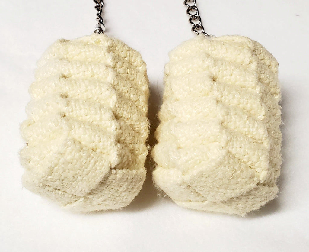 Fire poi set with two yellow textured sponge heads on silver chains