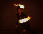 Fire staff with multiple burning wicks along the pole ends