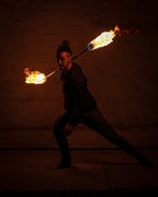 Fire staff with bright flames from both wick ends