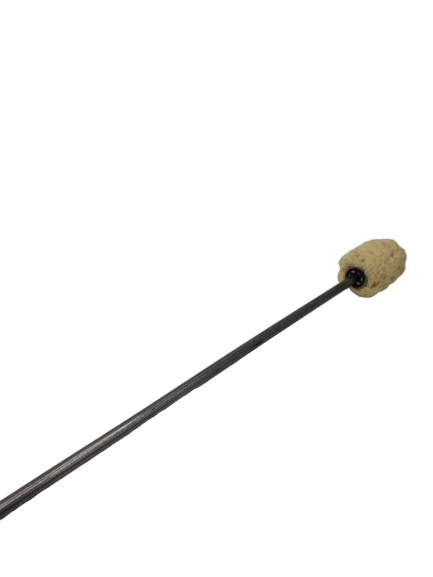 Close view of a fire torch: tan woven head on a black metal rod