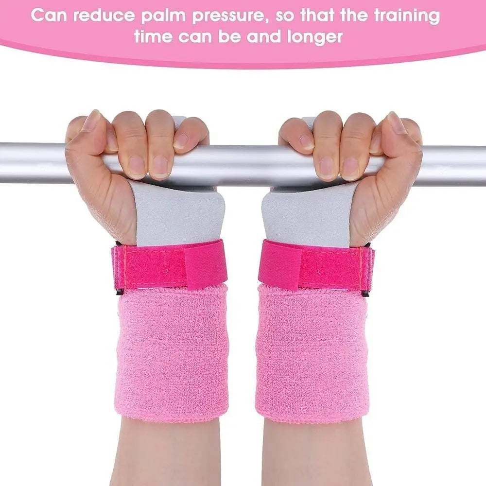 Youth aerial grip set wristbands with pink fabric cuffs and black Velcro