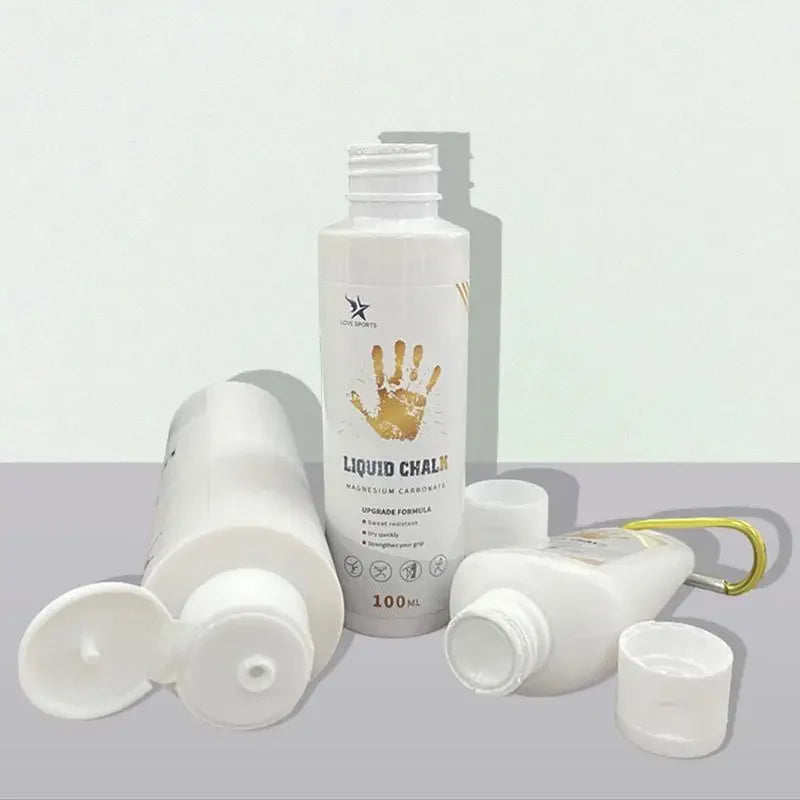 Liquid magnesium grip bottles with white pump tops and golden handprint graphics