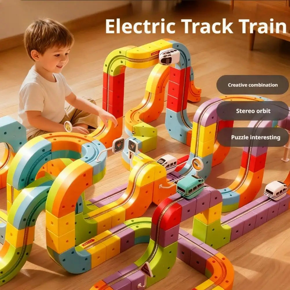 Electric track train cube set with curved rails, train car, and signal lights
