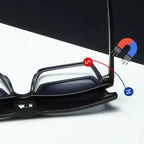 Black glasses showing the magnetic clip attachment on the temple