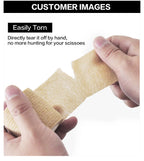 Beige self-adhesive wrist bandage tear demo held by hands