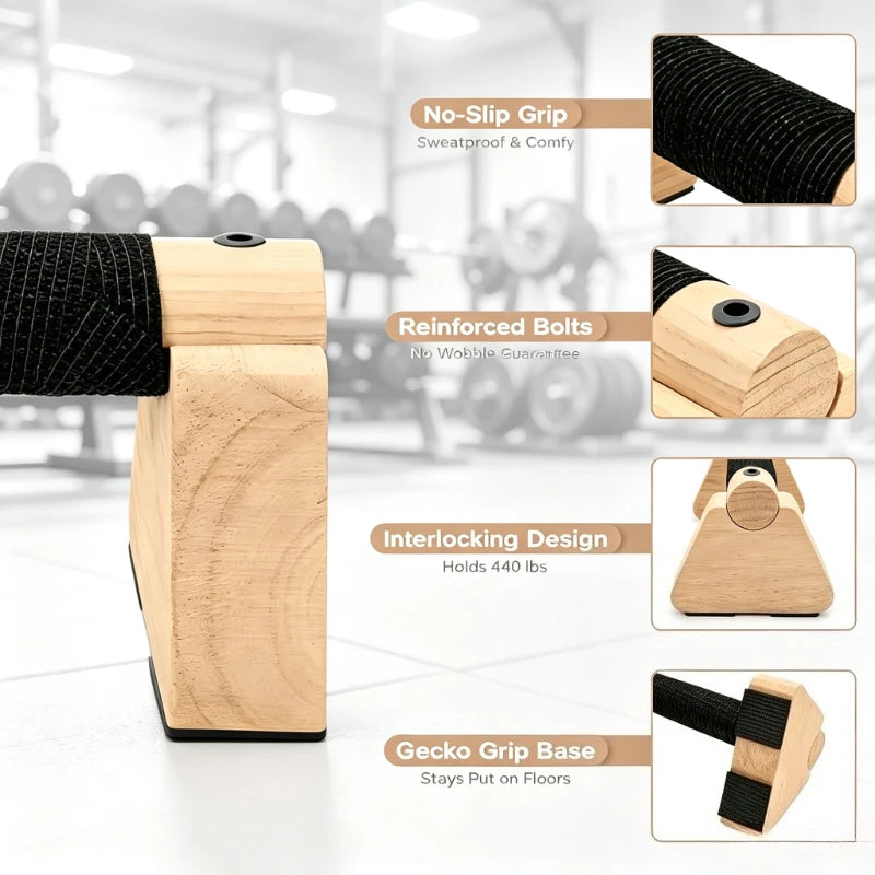 Wooden parallettes with black textured grip pads and reinforced wooden base construction