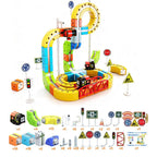 Electric cube track train set with looping yellow rails, train car, and signal towers