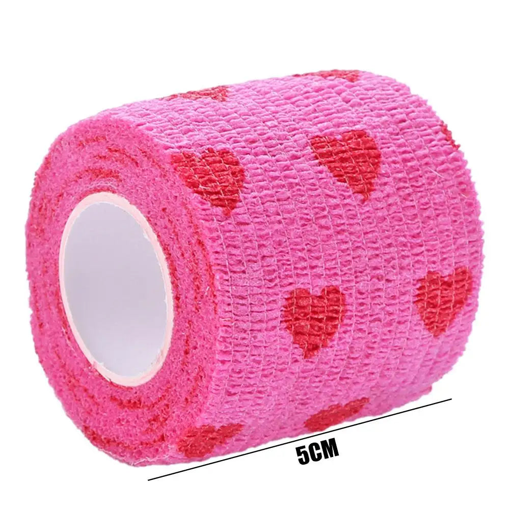 Bright pink self-adhesive bandage roll with leopard print and white inner core