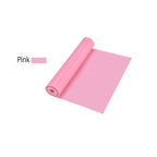 Pink resistance band roll, smooth elastic sheet coiled with a rolled edge
