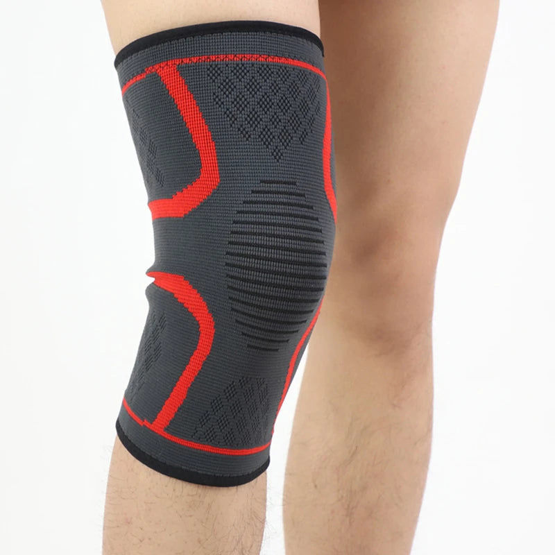 Black knee sleeve with red U-shaped support bands and textured compression fabric.