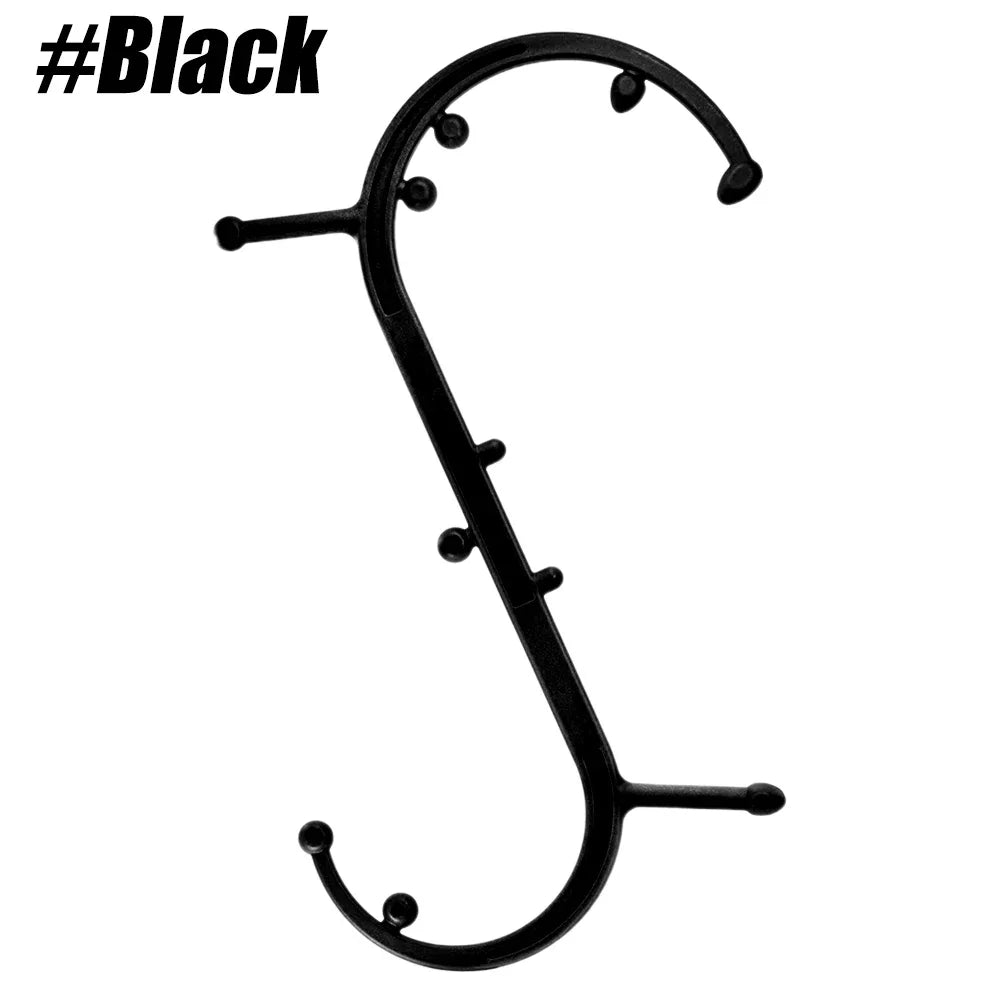 Black handheld self-massage cane with curved frame and knob contact points
