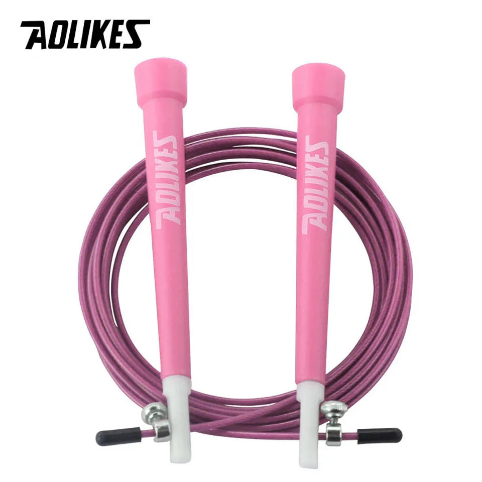 Adjustable steel wire jump rope with pink foam handles and purple steel cable