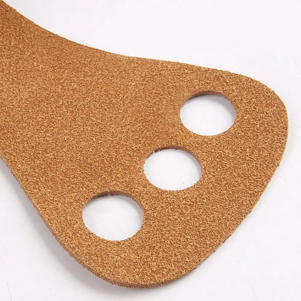 Aerial apparatus grip wraps pair, tan, close-up of three circular finger cutouts