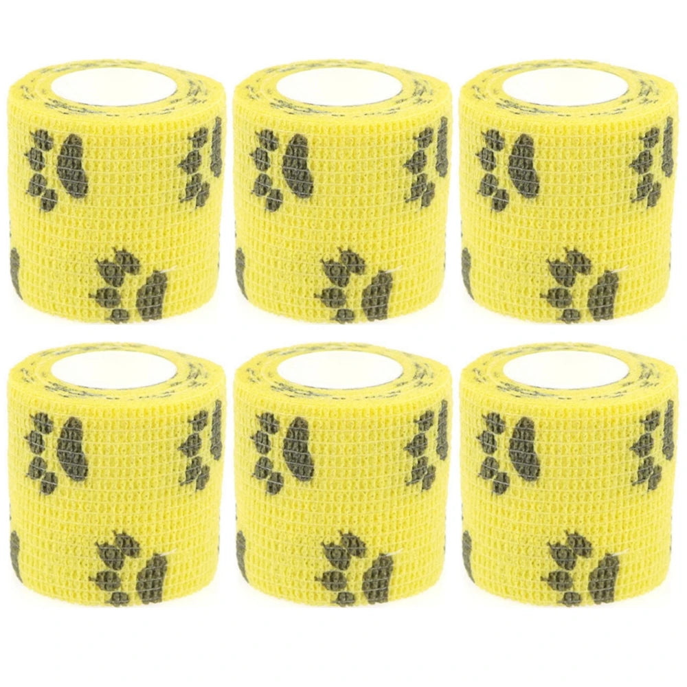 Set of yellow self-adhesive wrist bandage rolls with black paw and bone icons