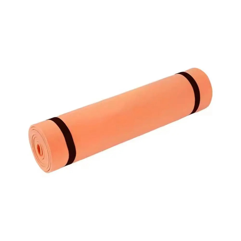 Orange EVA foldable exercise mat, rolled cylinder with black bands