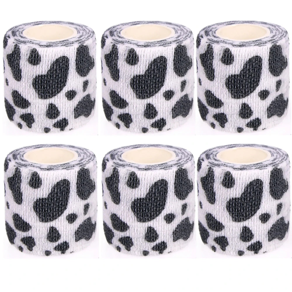 Set of white-and-black cow-print self-adhesive wrist bandage rolls