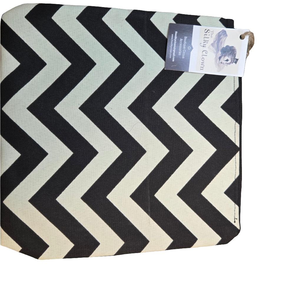 Handmade cloth gear bag with black chevron zigzag pattern and fabric handle tab