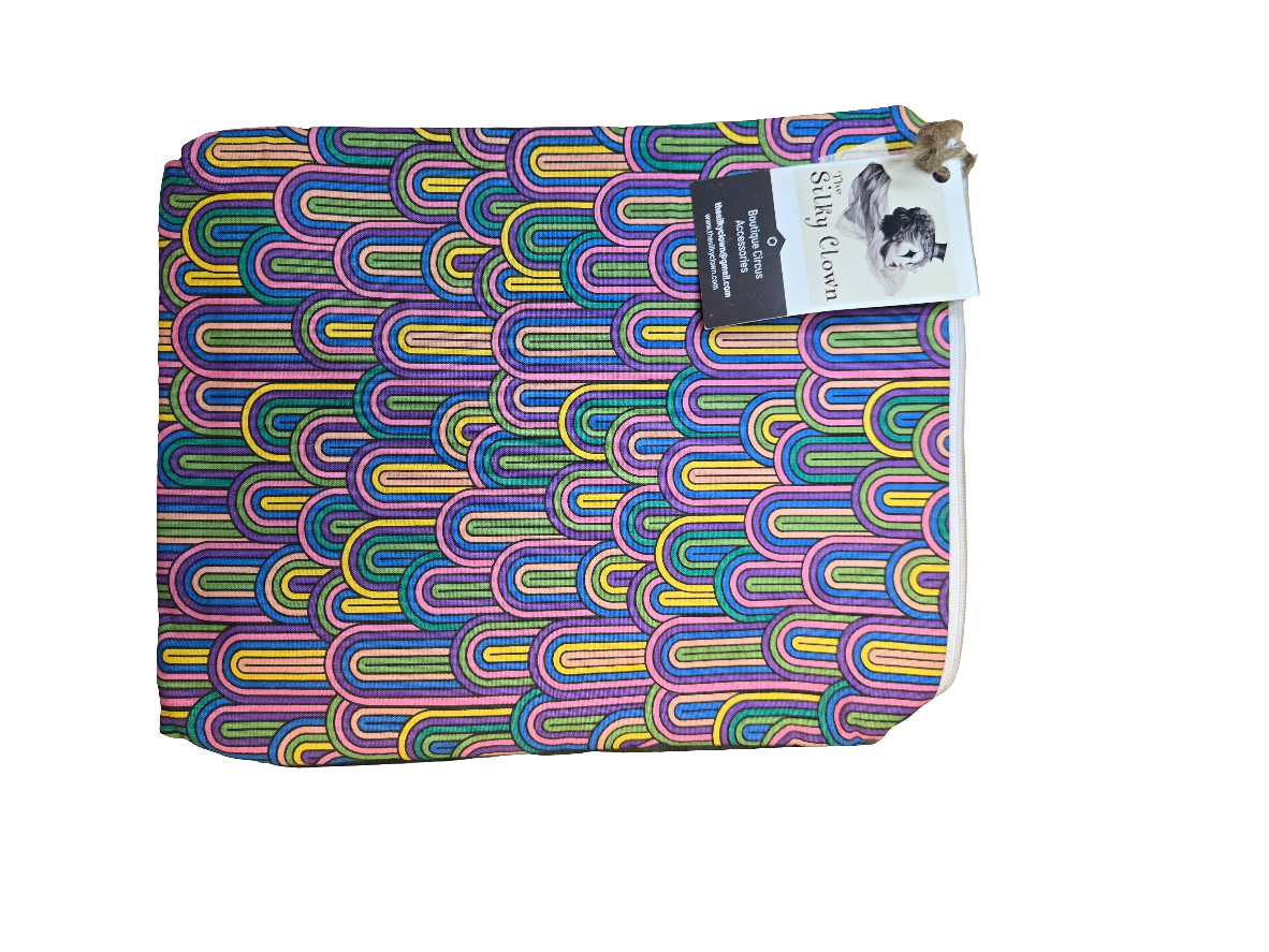Handmade cloth gear bag with colorful rainbow wave pattern and fabric handle tab
