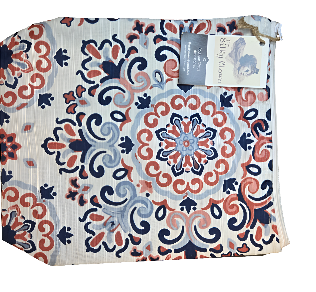 Handmade cloth gear bag featuring multicolor floral scroll pattern with top fabric handle