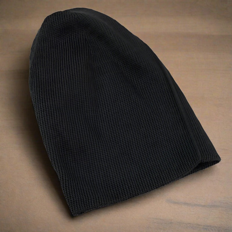 Black kevlar knit beanie with ribbed texture, no logo