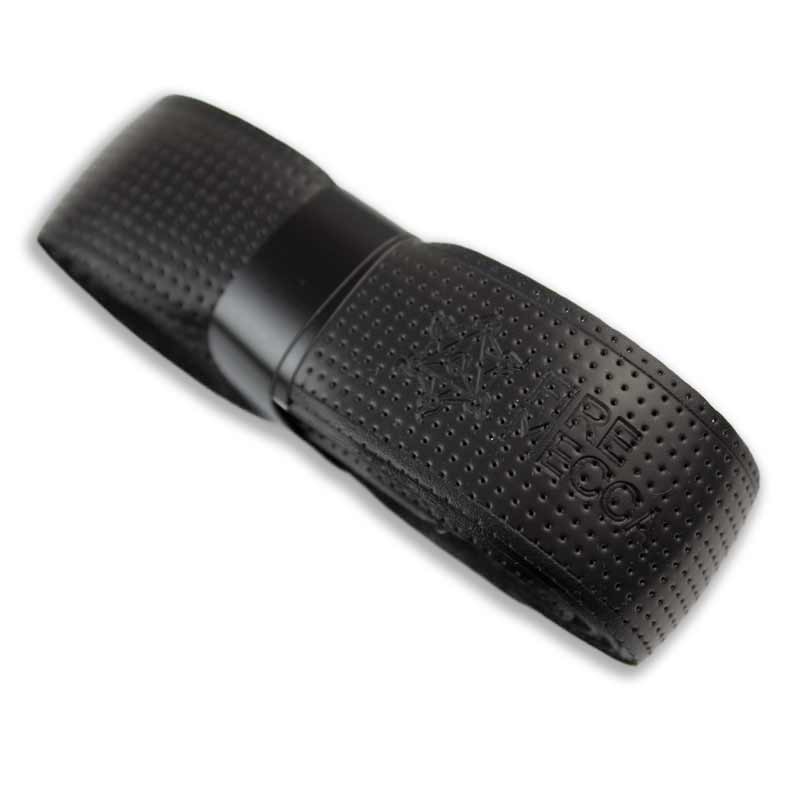 Black grip tape roll end, embossed emblem on perforated surface