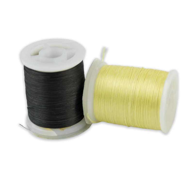 Two Kevlar thread spools in black and yellow with hanging thread strands