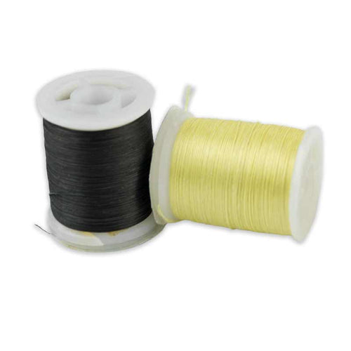 Two Kevlar thread spools in black and yellow with hanging thread strands